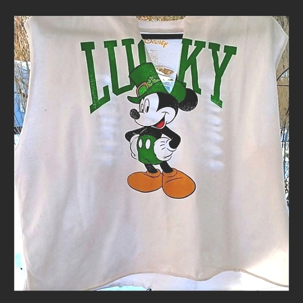 DISNEY™️ ST.PATRICKS DAY WOMEN'S DISTRESSED MUSCLE TEE WITH BACK SLIT